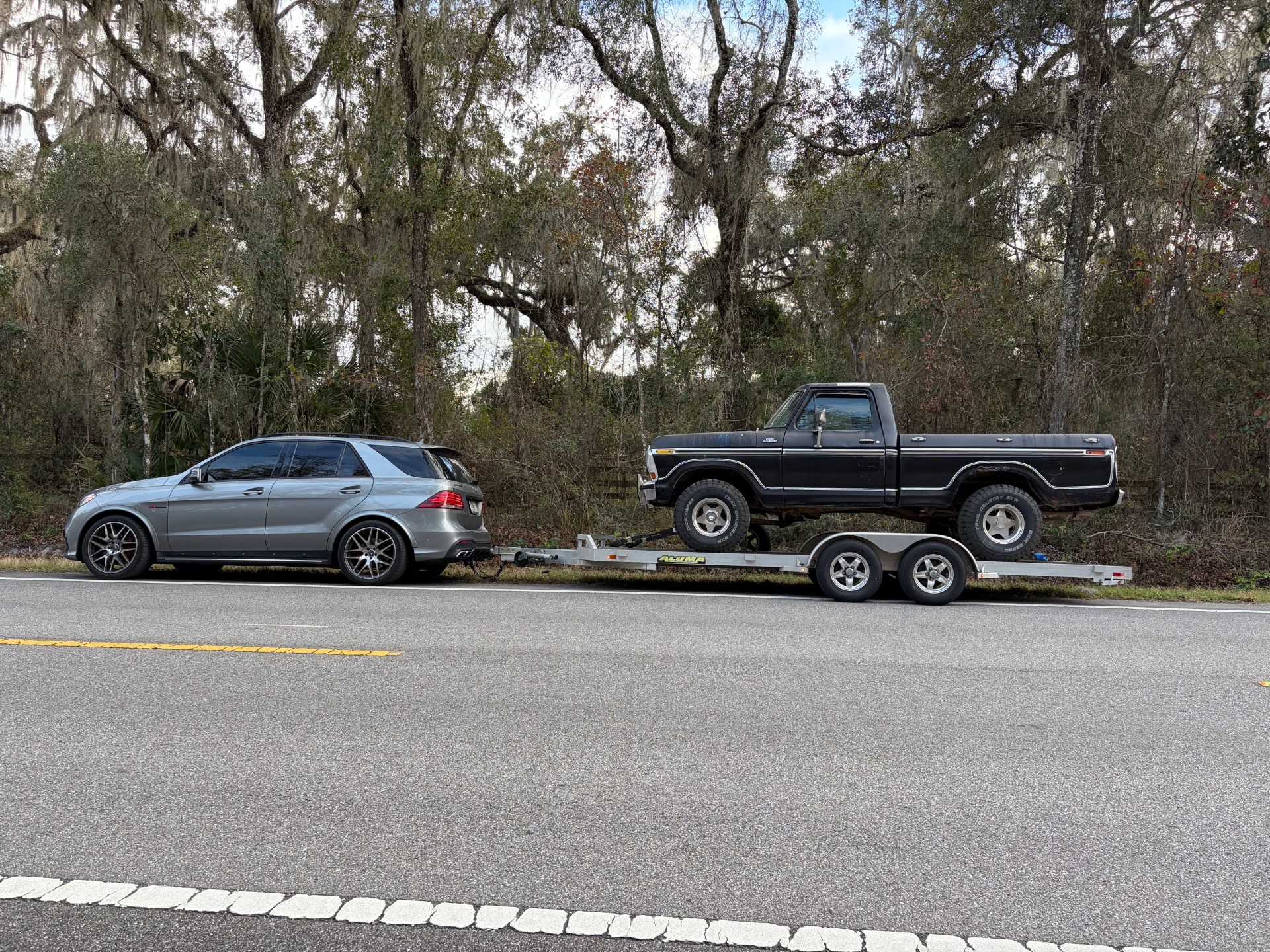 Vehicle transport — SUV and trailer pickup in Florida